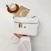 Nuevo bolso de caja tejido de verano y otoño, bolso de mano de nicho, bolso cruzado simple para el día a día, bolso de hombro para mujer