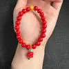 Pulsera de cinabrio al por mayor de fábrica Pulsera de arena roja Benmingnian león lugar escénico tiembla rápido mano de comercio electrónico una generación de envío