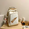 Mochila Escolar para Mulheres 2026 Nova de Aparência Sofisticada Costura em Contraste Moda Casual para Alunos do Ensino Fundamental e Médio Mochila Versátil