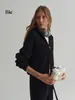 Un cárdigan de punto práctico y elegante de manga larga con cuello alto y mangas raglán, perfecto para mujeres en otoño, con un diseño de doble cremallera