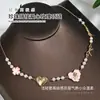 Collar de Perla Rosa con Corazón de Goteo de Aceite Transfronterizo para Mujer, Estilo Retro Dulce, Atmósfera de Lujo Ligero de Nicho, Colgante Juvenil
