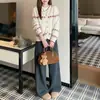 Cárdigan de punto Zeng Xiaoxian estilo coreano con bloques de color para mujer, otoño, corte holgado, adelgazante, cuello redondo, manga larga, versión corta, dulce y elegante