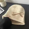 Gorro holgado de punto retro coreano con lazo, gorro frío para mujer, nuevo gorro cálido y a prueba de frío para otoño/invierno, protección para las orejas