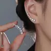 Aretes de perforación para oreja con forma de arco de siete estrellas para mujer, nuevo estilo 2026, lujo ligero, sensación de alta gama, ganchos para oreja de circonita, pendientes atractivos, de nicho, únicos