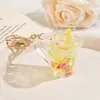 Copo de chá de leite iceberg de cristal garrafa flutuante chaveiro luminoso criativo pingente de mochila para copo de chá de leite boneca presente atacado