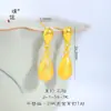 El Mismo Estilo que los Pendientes Redondos con Forma de Gota de Agua Girasol Oro Arena de la Tienda de Oro Puzuo, Pendientes Simples de Lujo Ligero, Gama Alta