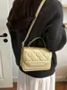 Bolso pequeño de alta gama con estampado de rombos, nuevo bolso de hombro en relieve de moda 2026, bolso cuadrado pequeño versátil para ventas transfronterizas