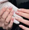 Puntas para uñas de arte de uñas de agua hervida simple, hechas a mano, de alta gama, exquisitas, color nude, ojo de gato, diamantes, puntas de uñas de presión, productos terminados, venta al por mayor de fábrica