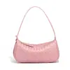 Bolsa Baguette de Venta Caliente Europea y Americana Moda Bolso de Hombro Único Debajo del Brazo Color Sólido Cuero Suave Tejido Bolso para Mujer Cruzado Bolso Dumpling Moderno