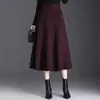 Saia elegante de lã em linha A para mulheres, nova coleção outono/inverno 2026, cintura alta, modeladora, plissada, moderna, versátil e com barra larga