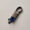 Directo de fábrica llavero de cuerda tejida accesorios de ferretería hebilla de herradura colgante para llave de coche accesorios de coche de moda