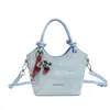 2026 Nuevo Bolso de Mano Estilo Coreano de Comercio Exterior Transfronterizo Bolso de Hombro de Moda Bolso Cubo Simple Elegante para Mujer Bolso Cruzado