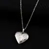Collar caja de fotos con forma de corazón de acero inoxidable con acabado espejo, patrón de plantas, cadena de eslabones planos cruzados
