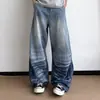 Jeans rectos de estilo americano de calle con textura desgastada para hombre, jeans de pierna ancha holgados y versátiles de moda vintage para primavera y otoño