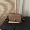 Otoño/Invierno 2026 Nuevo Elegante Simple Textura de Alta Calidad Diseño de Nicho Chic Versátil Bolso Cuadrado Pequeño de Hombro Cruzado