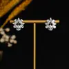 2023 nuevos aretes de circonita de flor aretes de clip para la oreja de comercio exterior aretes de cuentas de arroz generosos de punto joyería de boda para novia