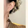 Pendientes Originales Hechos a Mano Estilo Chino Nuevo con Ojo de Tigre Cristal de Cristal Cuentas Pendientes Artísticos Retro de Gama Alta Lujo Ligero para Mujeres