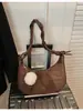 Bolsa Dumpling da Moda para Mulheres Outono e Inverno 2025 Coreana Ins Simples Versátil Bolsa de Ombro Nicho Tendência Bolsa Transversal