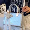 Outono de 2026 Novo Estilo Coreano Nicho Alto Valor Moderno Simples para o Dia a Dia Bolsa Pequena Feminina Transversal Quadrada Pequena