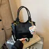 Bolsa Pequena Estilo Cesta Casual Primavera e Verão para Mulheres Novo Modelo 2026 Bolsa Transversal de Alto Padrão para o Dia a Dia Bolsa de Cesta Xadrez Estilosa