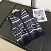 Nuevo chaleco de punto jacquard casual versátil para mujer, sin mangas, cuello redondo 13258