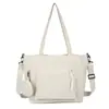 Bolso de lona de gran capacidad para mujer, nuevo modelo 2026, bolso cruzado simple y versátil, bolso de hombro casual para la escuela y el trabajo, bolso tote