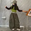 Calça Casual de Primavera e Outono para Meninas 2026 Nova Moda Estilo Coreano Bolso Grande Cargo Calça de Pernas Largas para Meninas Mais Velhas