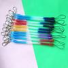 Cadena para teléfono móvil de cuerda de resorte de plástico de colores 5 mm cuerda de resorte de pu cadena de llaves cuerda creativa anti-pérdida hebilla de hierro tienda de 2 yuanes fábrica