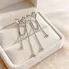 Pendientes Largos con Borlas y Lazo de Lujo Ligero, Diseño de Nicho Dulce y Elegante, Pendientes Versátiles con un Toque de Alta Gama