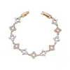 Pulsera de trébol de cuatro hojas de nuevo estilo coreano de lujo ligero, versátil, dulce, moderna, diseño de nicho, pulsera exquisita con forma de diamante de circón