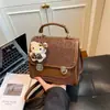 Mochila Mini Nova Compacta Estilo Universitário Inverno 2025 Nova Mini Mochila de Alto Padrão Luxo Leve Nicho Bolsa de Ombro Versátil