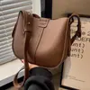 Bolsa Pequena Versátil Transfronteiriça para Mulheres Moda Nova Primavera/Verão 2026 Bolsa de Ombro Único Transversal Bolsa Saco Retrô para o Dia a Dia