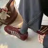 Aumento de altura interior de 7 cm~zapatillas de entrenamiento alemanas retro a rayas de cuero genuino para mujer, nuevo estilo coreano, versátiles, de retazos, casuales, deportivas, zapatillas Forrest Gump