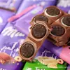 Chocolate importado de Alemania MILKA plato grande sándwich de leche de avellana tarjeta maravillosa chocolate de burbujas de panal