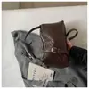 Nuevo bolso tejido de alta costura transfronterizo 2026, diseño elegante, bolso tote pequeño para salir, bolso de hombro y cruzado para mujer