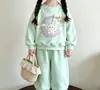 Elegante Conjunto de Ropa de Otoño para Niños Pequeños: Sudadera de Manga Larga con Lazo de Dibujos Animados y Pantalones Jogger, Conjunto Deportivo Versátil de Dos Piezas para Niñas