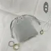 Bolsa de Terciopelo para Joyería Bolsa con Cordón Venta al por Mayor Bolsa de Embalaje con Cordón Bolsa para Guardar Auriculares con Logo Impreso con Cordón