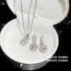 Un racimo de flores~ Pendientes de perla de bola de circón de lujo, sensación de lujo ligero y alta gama, pendientes de temperamento elegante francés