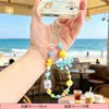 Cadena para teléfono de cuentas color dopamina con lazo en forma de corazón, llavero, colgante para bolso, correa para cámara CCD