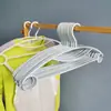 Percha para colgar ropa para el hogar antideslizante sin marcas para secar ropa anti ángulo de hombro protege el cuello estante para colgar uso dormitorio de estudiantes percha para ropa