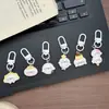 Chaveiro fofo de desenho animado de foca adorável, bolinho de pudim, charme feminino para mochilas de estudantes, presente para melhores amigos
