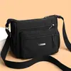 Bolso bandolera duradero de tela Oxford para mamás, con múltiples bolsillos con cremallera, un diseño portátil y correas anchas para el hombro, perfecto para el uso diario