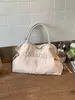 Bolsa de bordado floral de nicho estilo coreano para mulheres, nova bolsa de mão de tecido 2026, bolsa tote de ombro de grande capacidade para o dia a dia