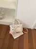 Bolso de Mano Pequeño de Comercio Exterior Transfronterizo para Mujer, Nuevo Estilo Coreano Ins Bolso Cubo Versátil, Bolso de Hombro Cruzado Elegante para Viajes
