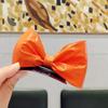 Tienda de fábrica nuevos accesorios para el cabello de niños al por mayor PU artificial brillante lazo tridimensional pasador clip superior joyería