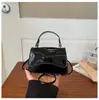 Bolso de mujer vintage 2026 modelo nuevo, color liso, texturizado, moderno, simple, diseño de nicho, bolso de hombro, bolso casual para mujer trabajadora