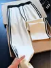Pantalones deportivos de punto gofre estilo americano a rayas de bloques de color para hombre, corte ajustado, pierna recta, pierna ancha, pantalones casuales para otoño