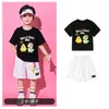 Roupa de performance de cheerleading para o Dia das Crianças, conjunto de manga curta com estampa de desenho animado para jardim de infância, fantasia de performance esportiva para aluno do ensino fundamental