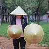 Venta directa sombrero de bambú hecho a mano con cuero verde para el sol protector solar ala grande sombrero para salir accesorios de escenario sombrero de fibra de coco sombrero de paja de agricultor