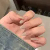 Adesivos de unha usáveis na cor nude, estilo longo, luxo leve, peças de unha para manicure com gradiente de diamantes grandes, unhas postiças prontas, atacado do fabricante